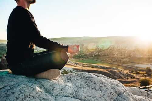 man doing yoga discovers how to get sober