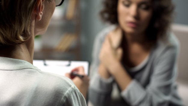 woman talking to female therapist in a drug treatment center near eugene or