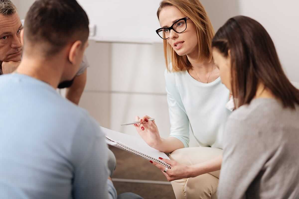 a doctor telling her patient that they are a social alcoholic