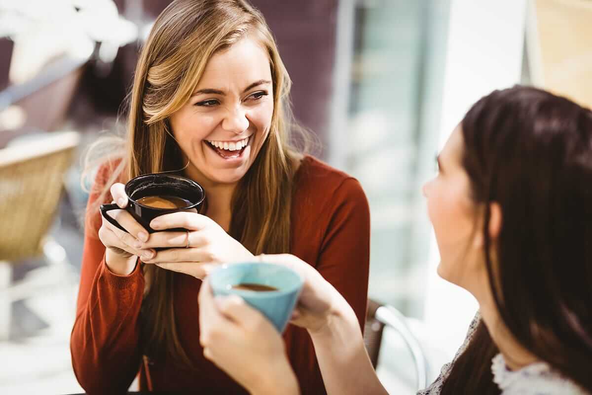 two women discussing different mdma effects they have experienced