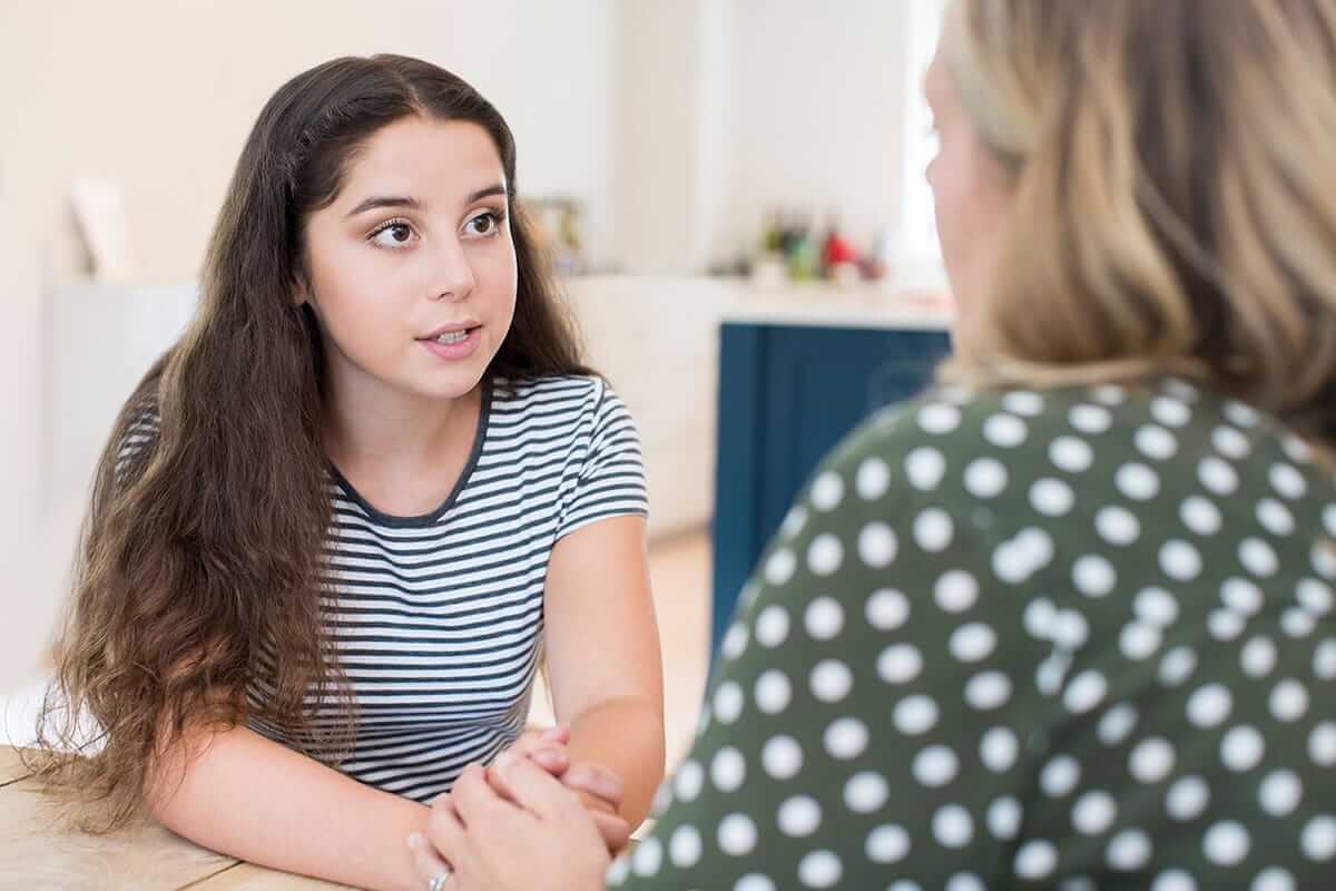 a parent explaining to their teen what is xanax