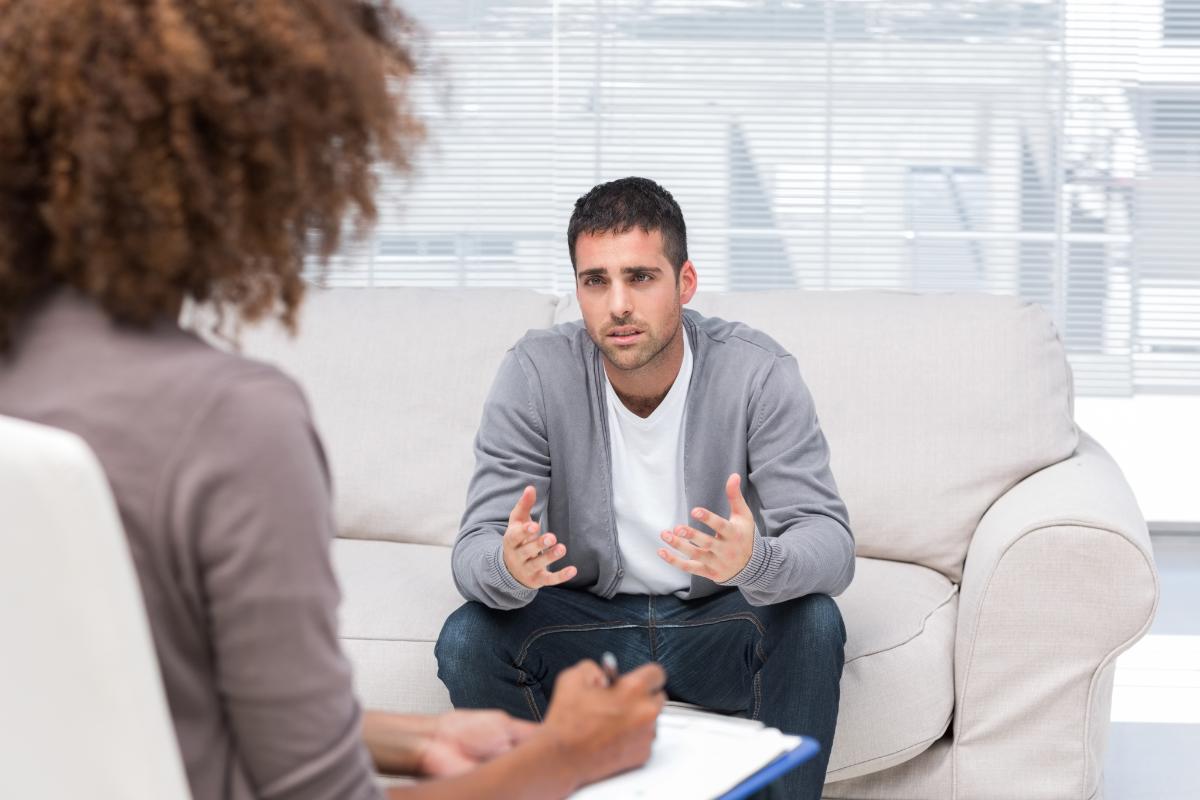 man discussing flakka vs meth with therapist