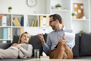 a patient and doctor discussing a Drug Rehab Center near Salem