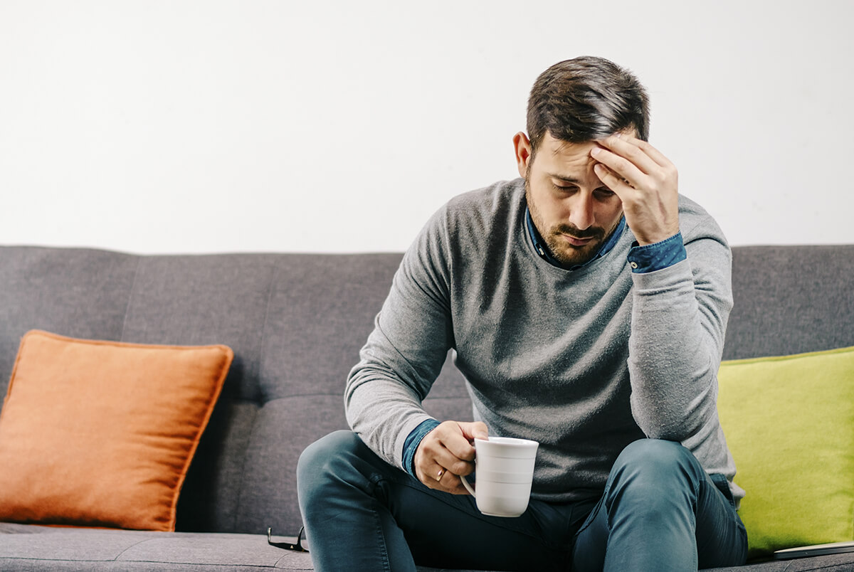 a man drinking coffee wondering what is salvia