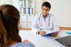 Doctor helping patient in the Alcohol Rehab Center near Albany