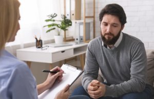 Man getting help from counselor at an Alcohol Rehab Center near Anacortes