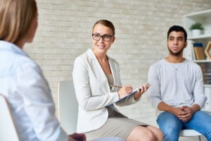 Man looking at counselor in a Drug Rehab Center near Blaine