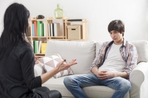 Counselor talking to patient at Rehab Center near Bonney Lake 