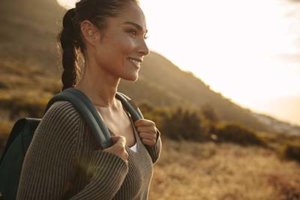 woman smiling during hiking activity at the drug rehab center near Battle Ground Washington