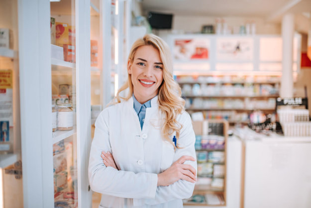 a doctor smiles as she thinks about todays most prescribed drugs