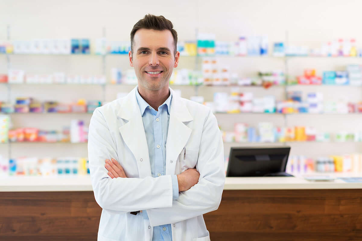 a doctor crosses his arms as he wonders what drugs are opiates