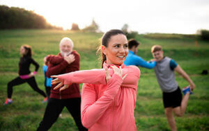 a group of people do yoga at a heroin rehab center near bingen