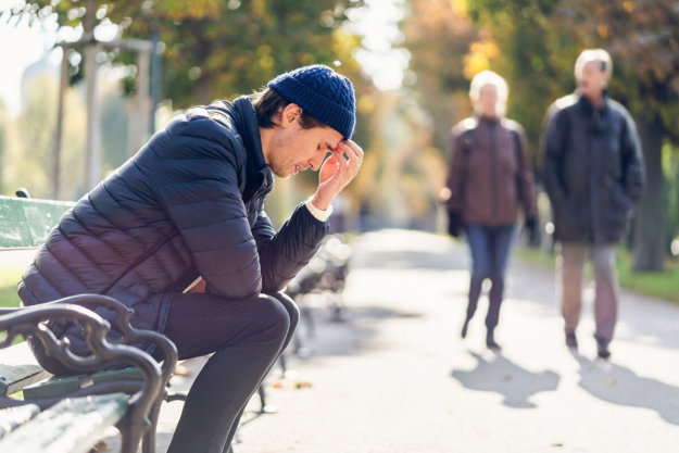 man thinking about triggers and recovering addicts