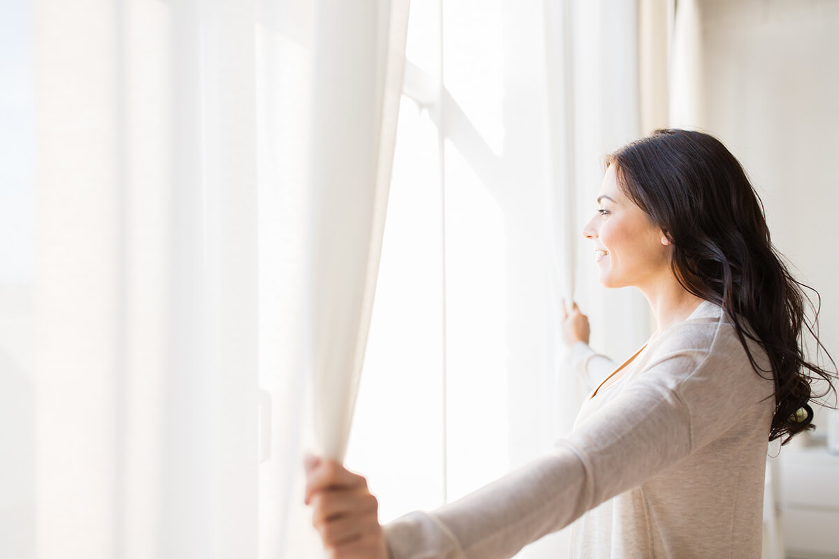 woman thinking about prioritizing your recovery goals