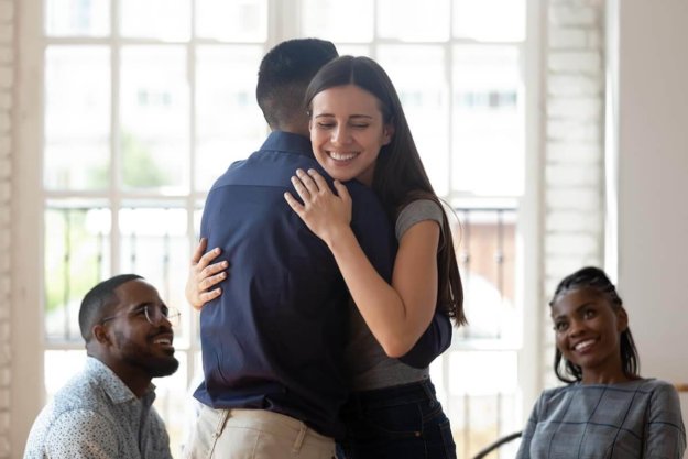 woman participating in group therapy and self care