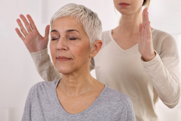 woman learning about the benefits of holistic drug rehab therapy