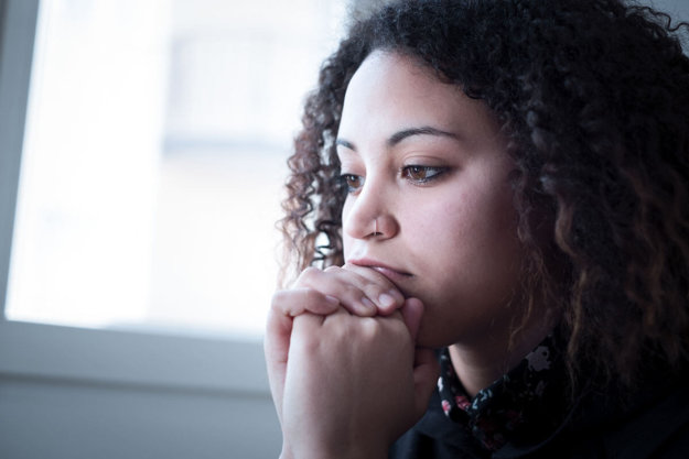 woman thinking about her addiction triggers