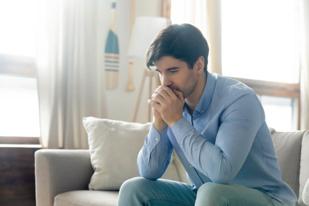 man learning about ways to cope with isolation in recovery