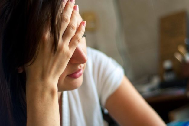 Woman thinking about stages of addiction