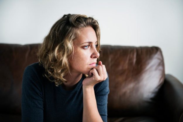 Woman thinking about opioids vs narcotics