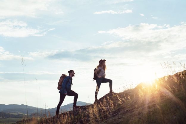 Two people experiencing hiking therapy for addiction