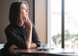 Woman wondering, "How long do prescription drugs stay in your system?"