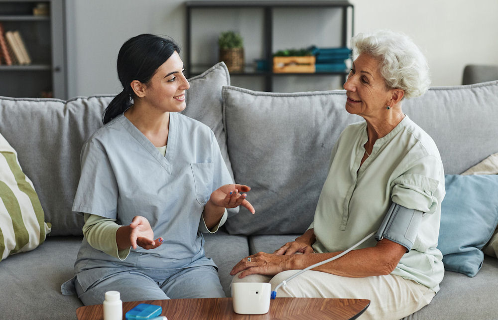 elderly woman in fentanyl detox being assisted by a nurse