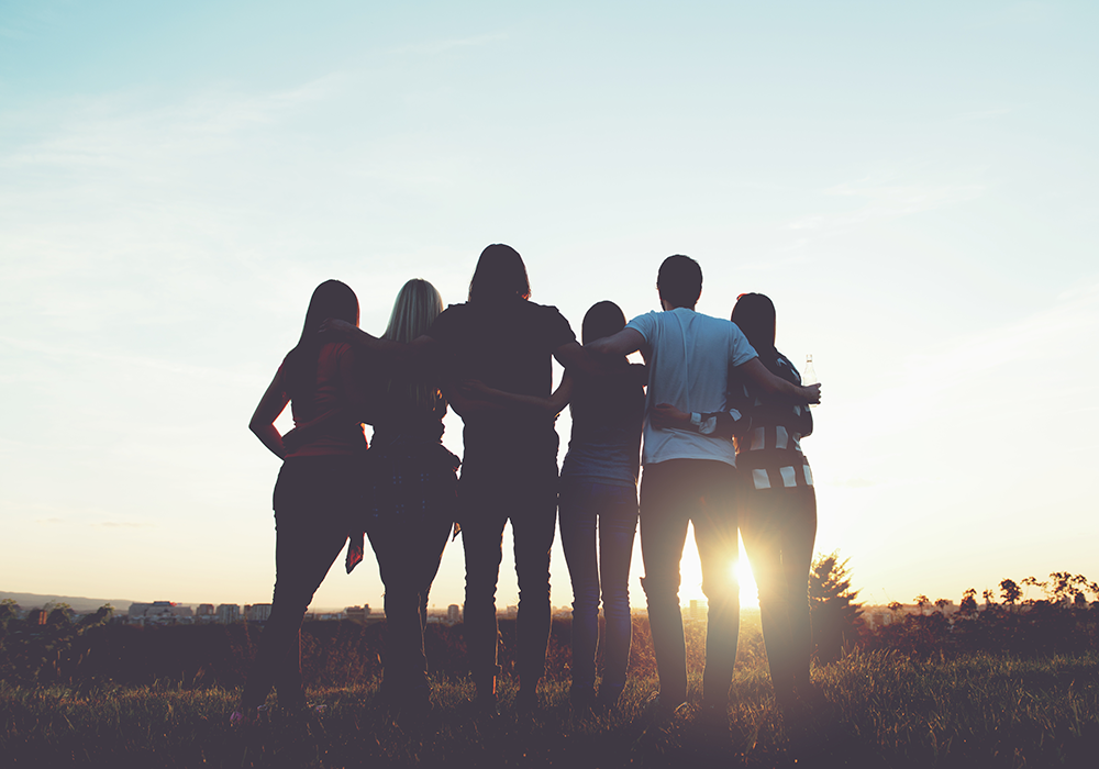 group standing together sober community