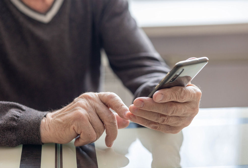 senior using cellphone to contact help