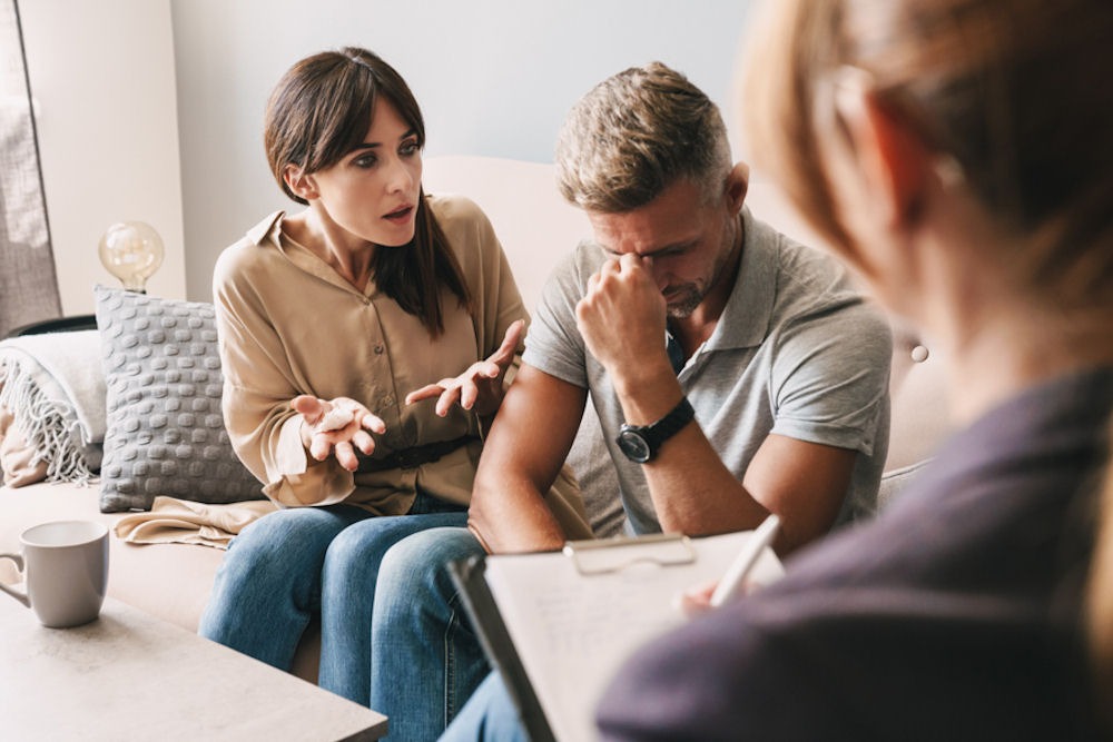 man and woman in couples counseling