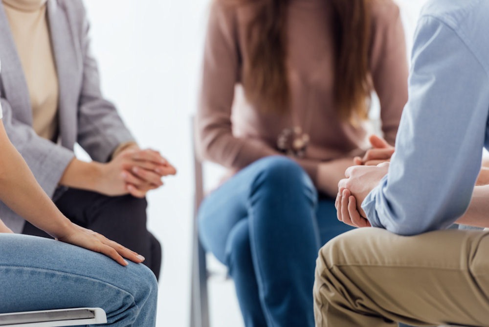 small support group sitting in a circle